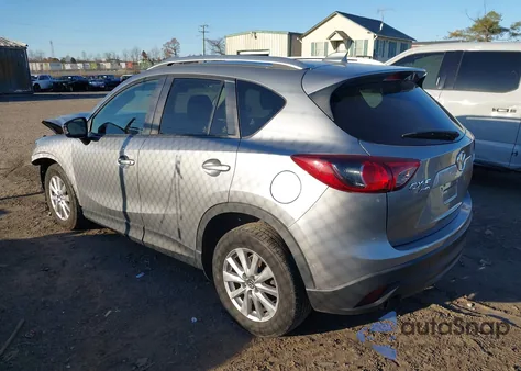 2014 Mazda Cx-5 Touring z USA, uszkodzony, nr VIN JM3KE4CY3E0393283